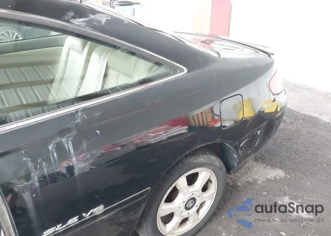 1999 Toyota Camry Solara Sle z USA, uszkodzony, nr VIN 2T1CF28P9XC212369